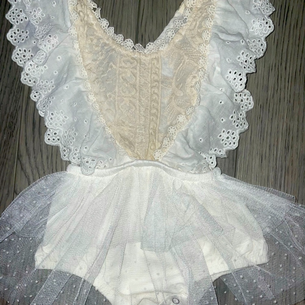 Girls one piece, one of a kind, ruffles and lace!